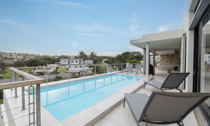 Robberg Beach Villa | Sunset Villa - top floor only - brand new home 200m from the beach