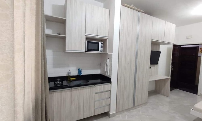 Curitiba Financial District Apartment | Kitchenette Aconchegante no Centro de Curitiba. Ótimo Custo-benefício!