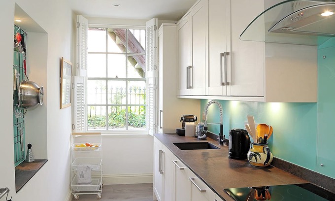 Sandgate Cottage | Relax on your balcony and enjoy the stunning, far reaching sea views overlooking Sandgate Bay.