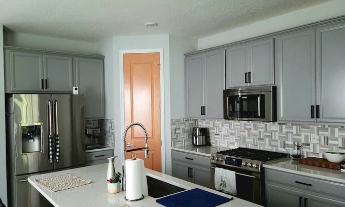 St. Johns House | Family home in Beachwalk with roomy common areas and private spaces for a group.