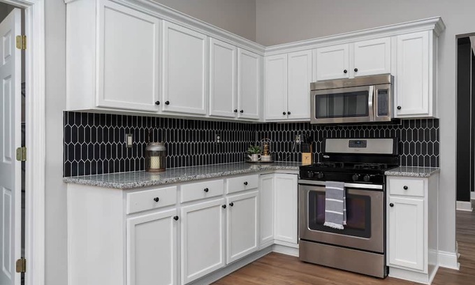 Alabaster House | Enjoy a Gardenside Getaway - Fenced Yard & Patio