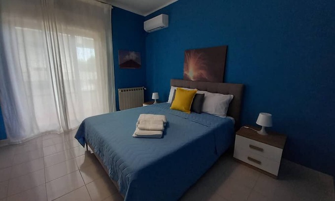 Pace del Mela Apartment | Room 'Stromboli' with Sea View, Wi-Fi and Air Conditioning