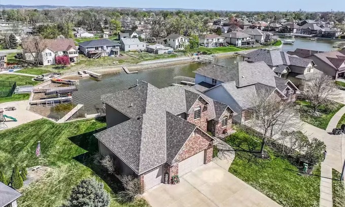 Carter Lake House | 5 bed 3 miles to downtown Omaha and CWS. Hot Tub, Pool Table & Dart Board